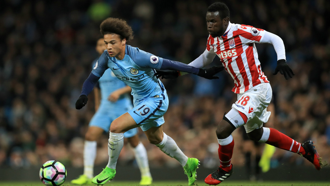 SEE YOU LATER: Sane escapes the attention of Mame Biram Diouf.