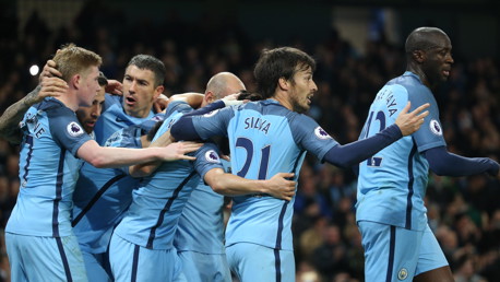 TOGETHER: The team rush to congratulate Pablo Zabaleta