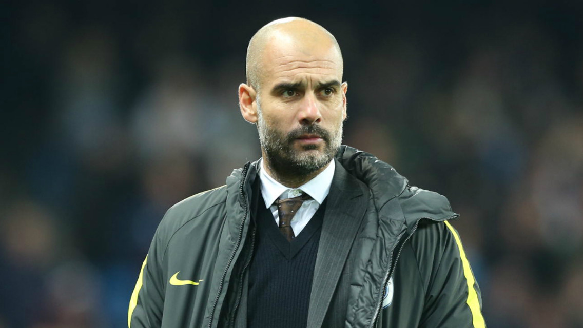 FOCUSED: Pep Guardiola examines proceedings