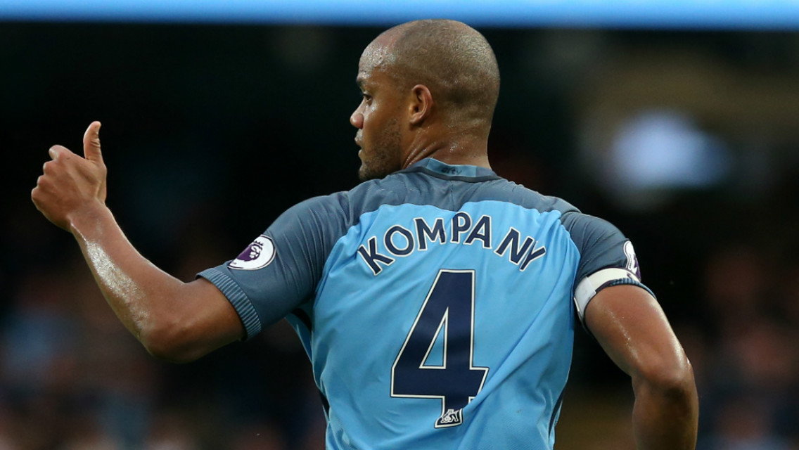 SKIPPER: Vincent Kompany celebrates as City go two clear