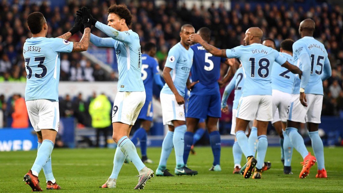COLLECTIVE: City's players celebrate a devastating team move.