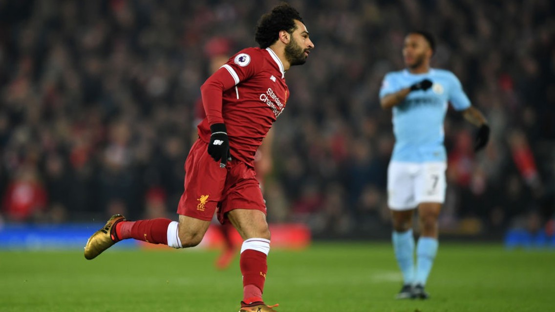 BEHIND: Mo Salah wheels away after scoring Liverpool's fourth.