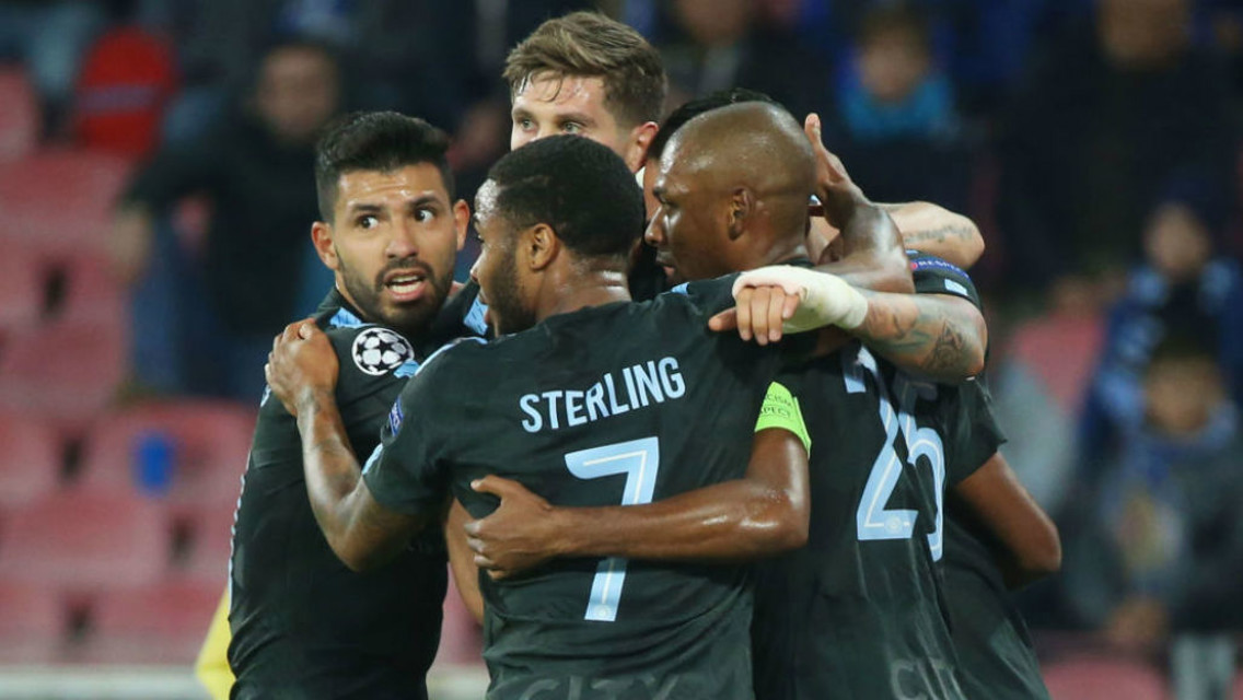 ITALIAN JOB: The City players celebrate after Nico's header