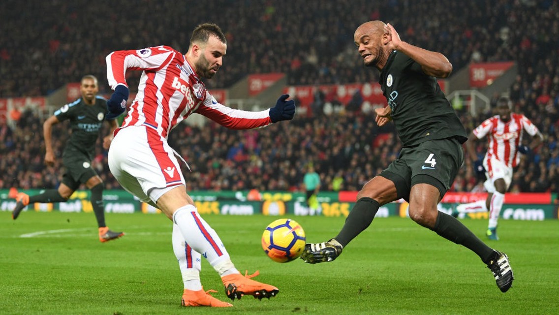 ​COMMITMENT: Vincent Kompany blocks Jesé's effort on goal.