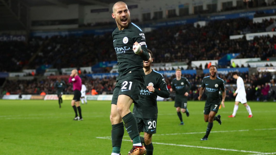 WALKING ON AIR: David Silva celebrates his second of the night. Unstoppable!