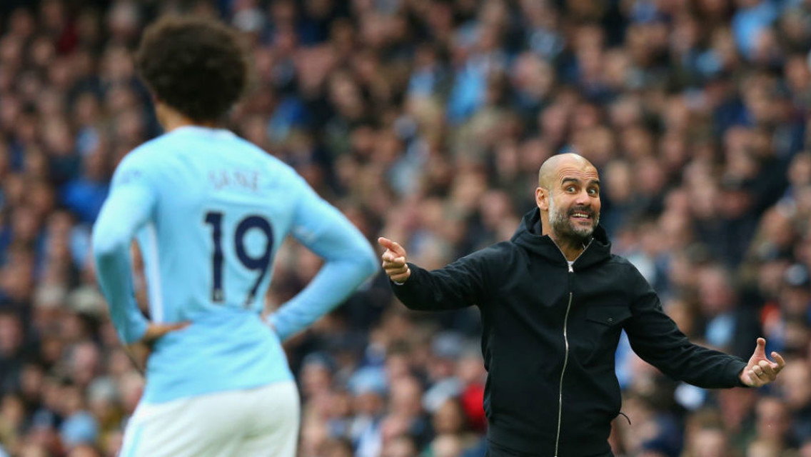 PEP TALK: Pep Guardiola gets his point across to Leroy Sane