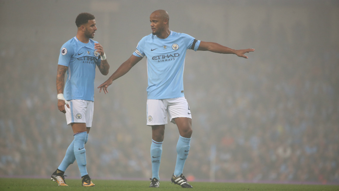 GIVING THE ORDERS: Kompany talks to Walker
