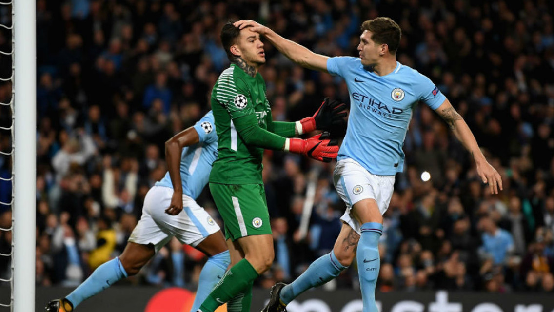 A BIG HAND: John Stones salutes Ederson after his penalty save