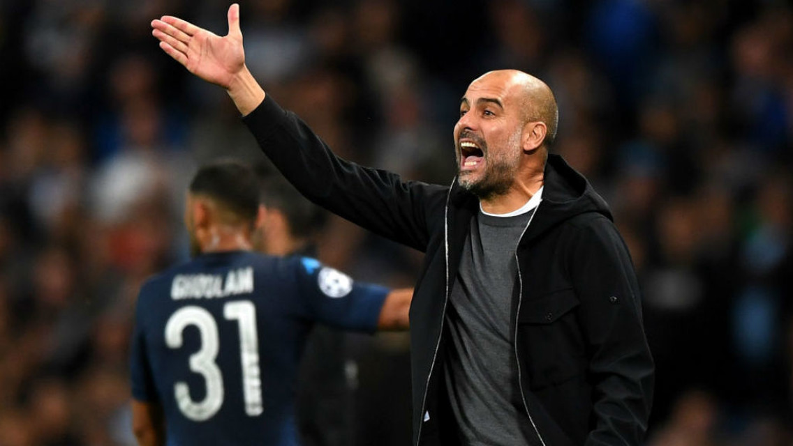 GOOD TO TALK: Pep Guardiola fires out some instructions