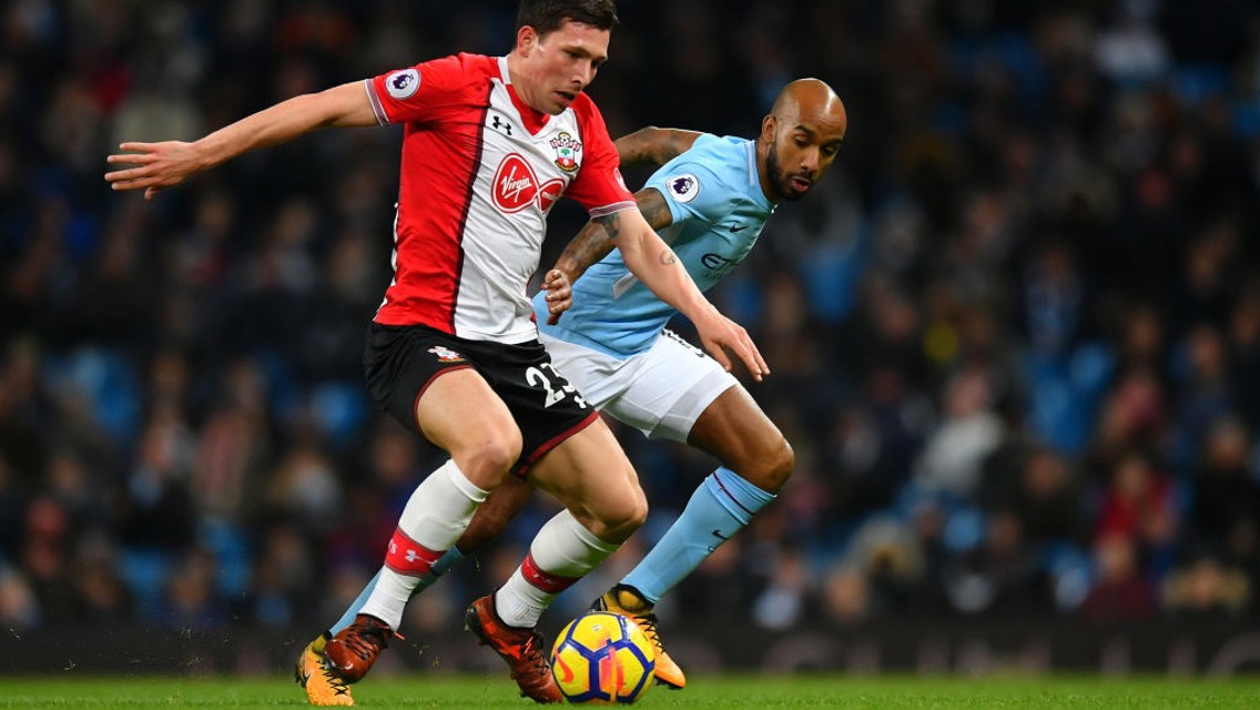 DEPENDABLE DELPH: Fabian patrols a now familiar left flank at the Etihad.