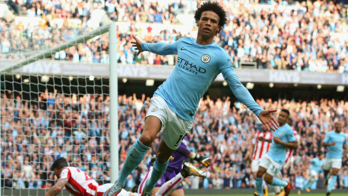 SIX OF THE BEST: Leroy Sane wheels away in triumph after making it 6-2