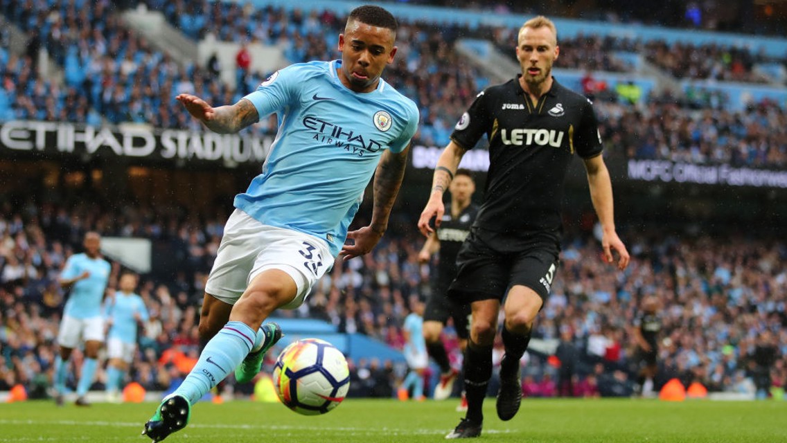 PROBING: Gabriel Jesus looks to extend City's lead before half time.