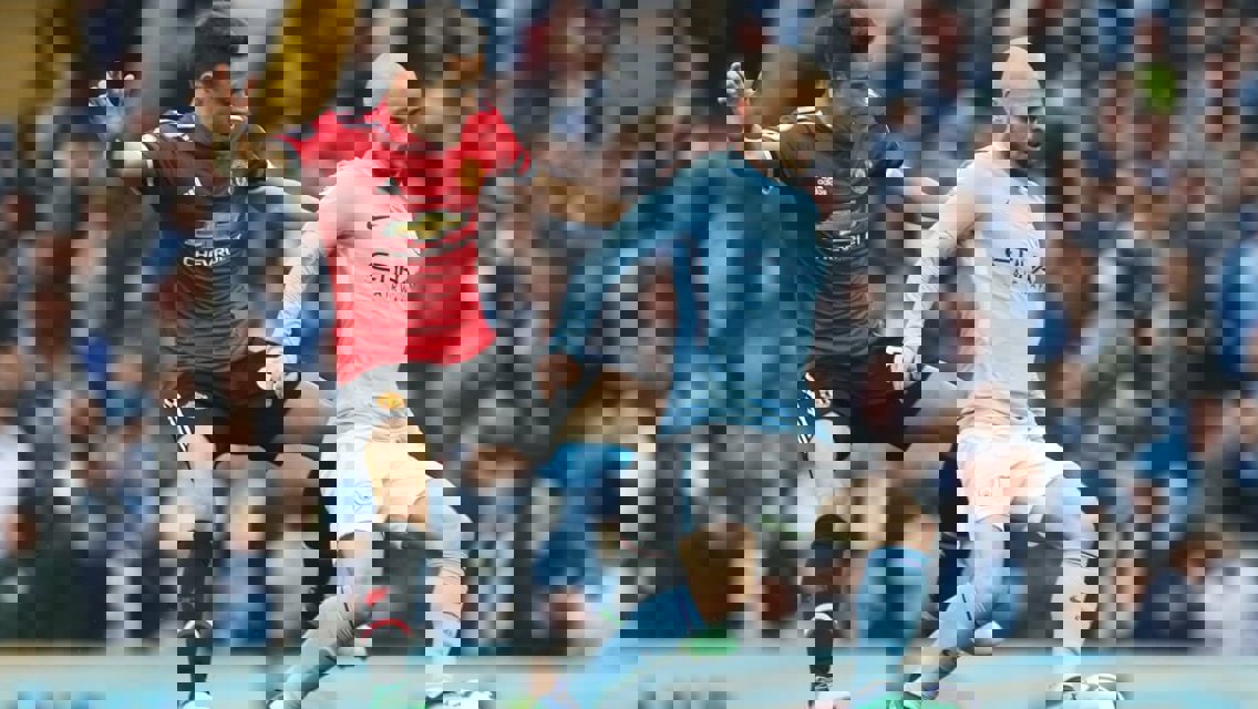 EL MAGO: David Silva keeps the ball from Ander Herrera.