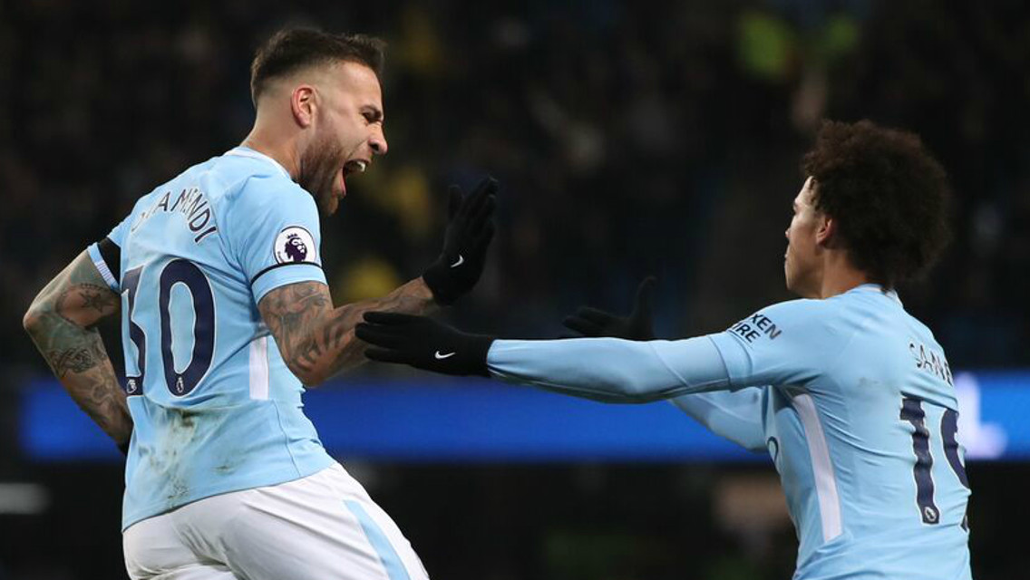 JOY: Leroy Sane congratulates Nicolas Otamendi
