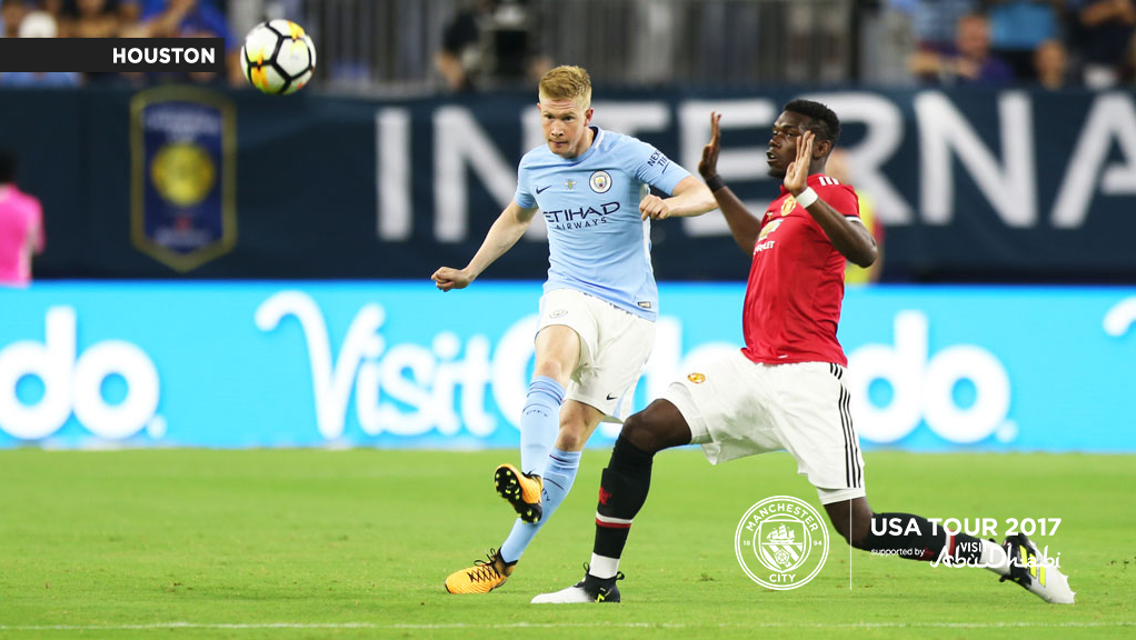 A CITY UNITED: Kevin passes the ball around Pogba