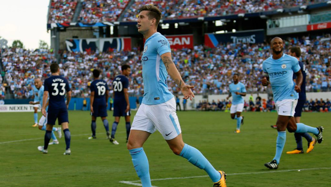 GOAL: John Stones celebrates against Spurs in the United States.