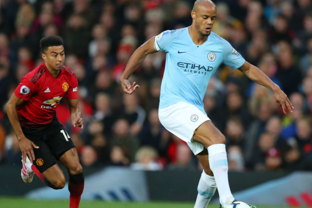 LEADING MAN: Skipper Vincent Kompany gets an early touch on the ball