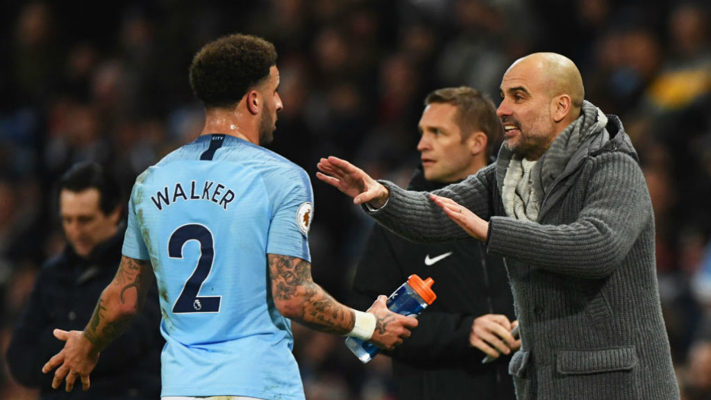 Guardiola gives orders to Kyle Walker.
