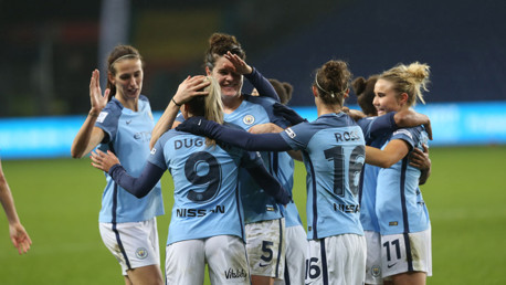 ECSTASY: The team congratulate Toni Duggan on her impressive strike