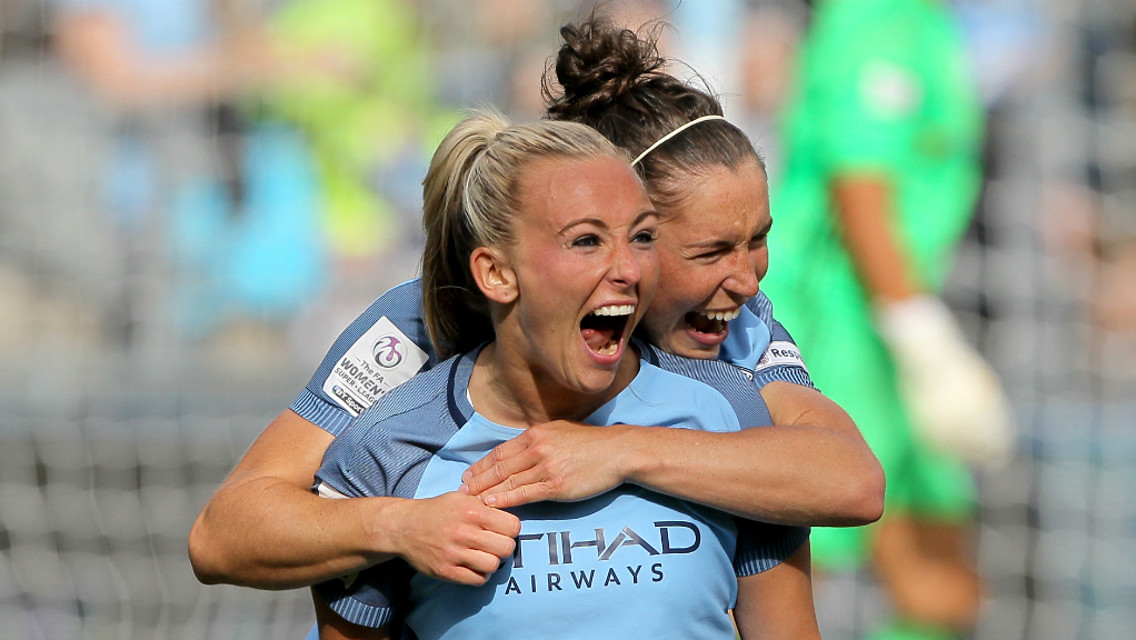 PARTNERS: Jane Ross congratulates Toni Duggan, who bagged from the penalty spot to secure the league title against Chelsea