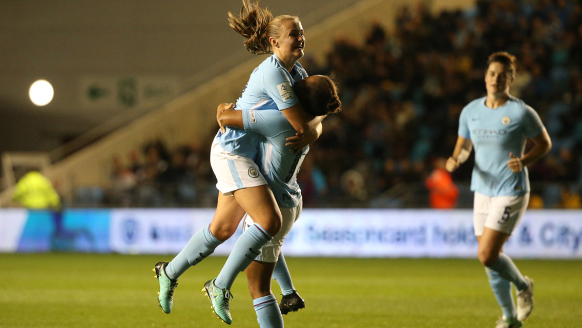 JUMP FOR JOY: Georgia Stanway congratulates Nikita Parris on her goal