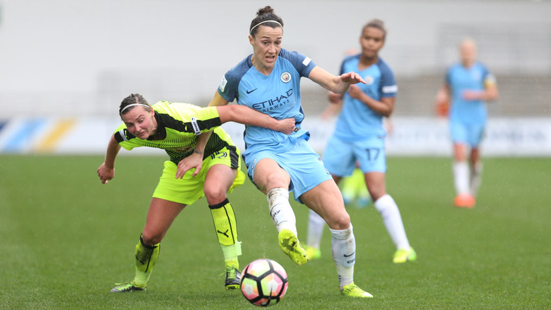 BATTLING BRONZE: Lucy and Anna Green challenge for possession.