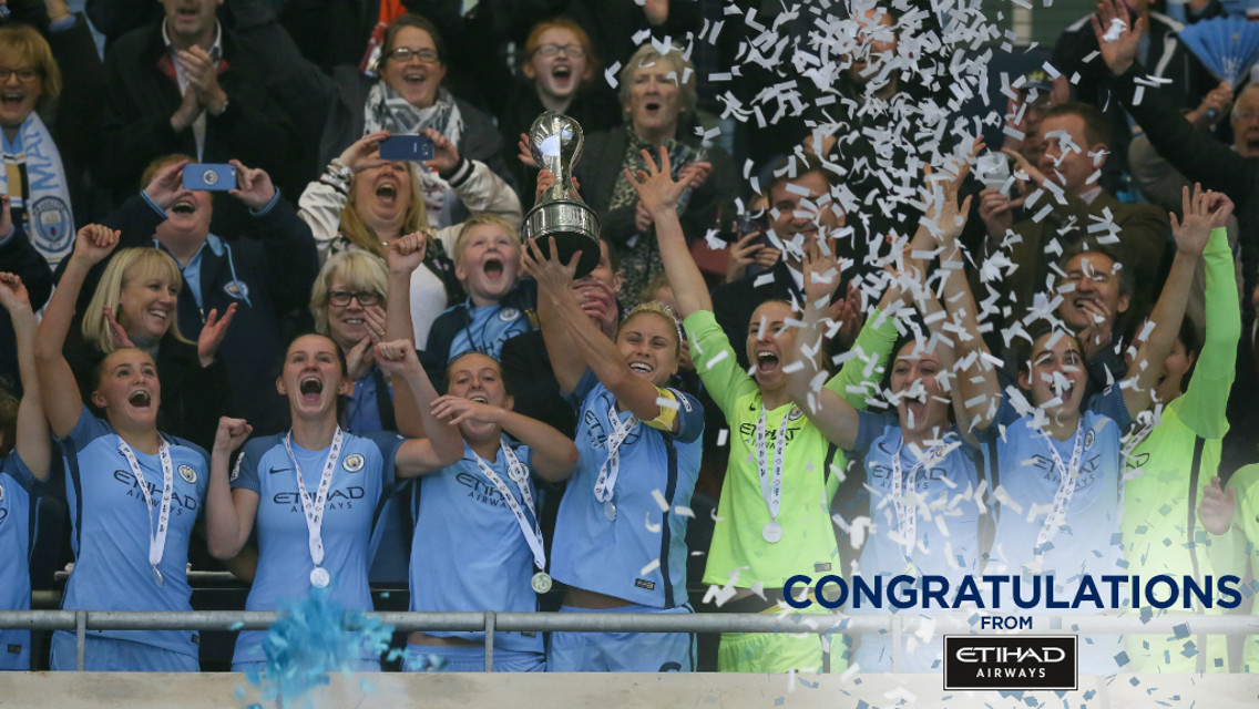 CHAMPIONS: Captain Steph Houghton lifts the FA Women's Super League trophy for the first time with Man City Women