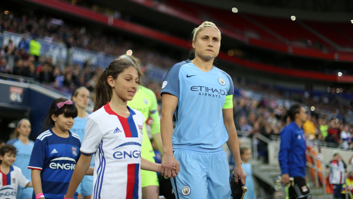 SKIPPER: Steph Houghton leads the team out in Lyon