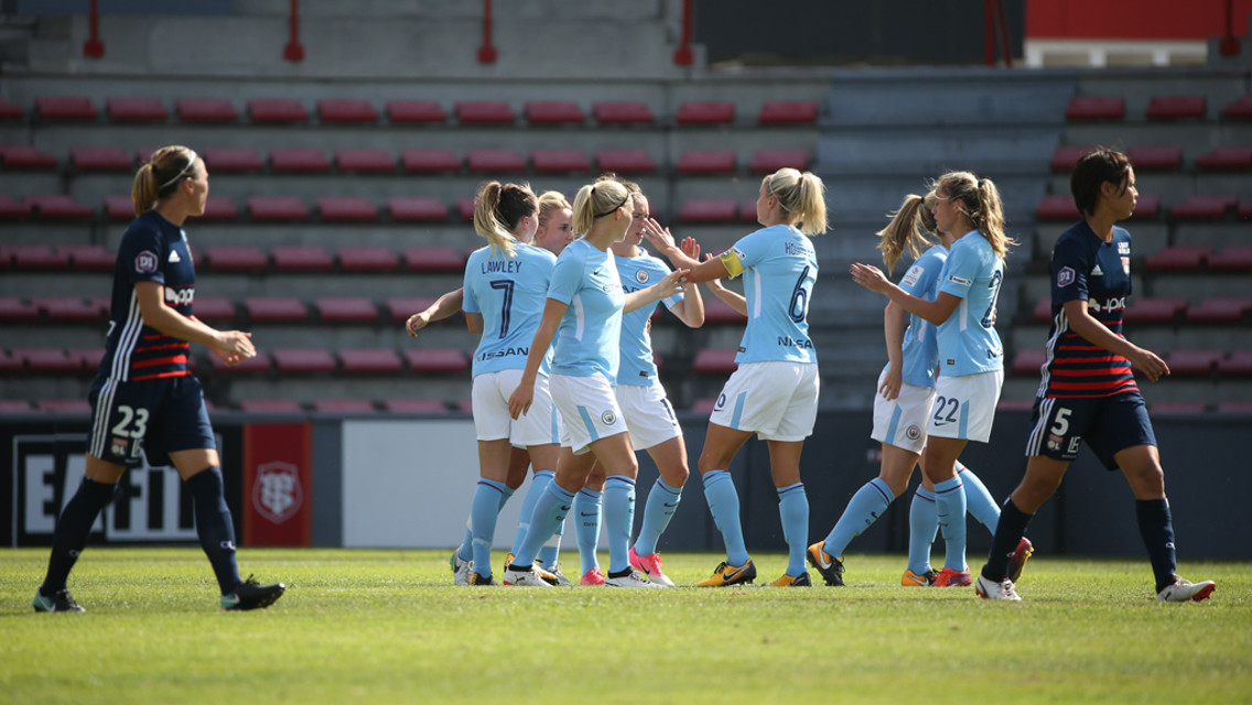 DOUBLE: Izzy Christiansen is congratulated on her second of the game