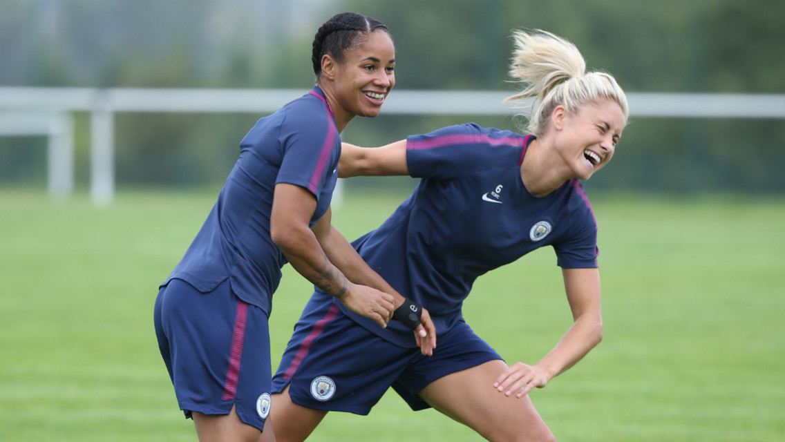 FUN AND GAMES: Demi Stokes and Steph Houghton joke around