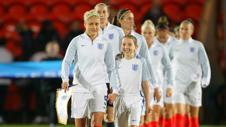 SKIPPER: Captain Steph Houghton leads England out onto the Keepmoat Stadium pitch against France