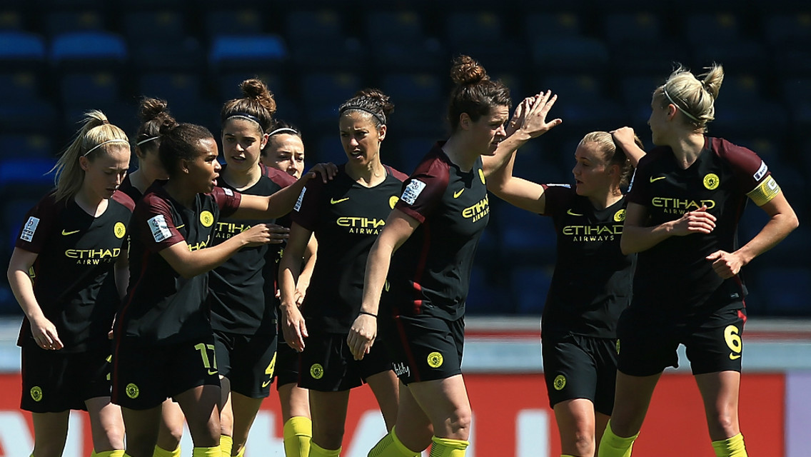 PARRIS LIFE: Nikita Parris is mobbed following her opener at Reading