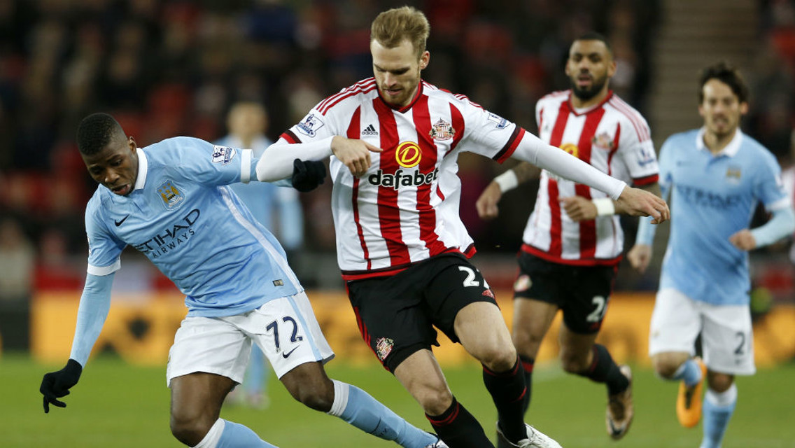 BATTLE: Iheanacho and Kirchoff locked in combat during the last meeting between the sides.