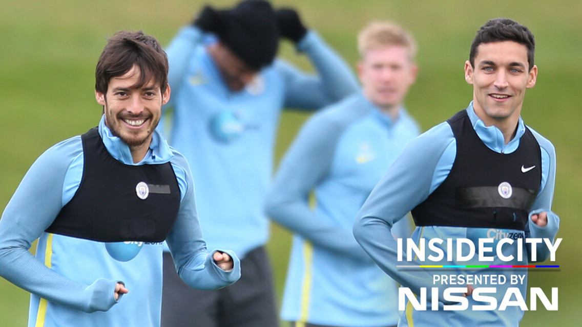 SPANISH SMILES: David Silva and Jesus Navas enjoying training