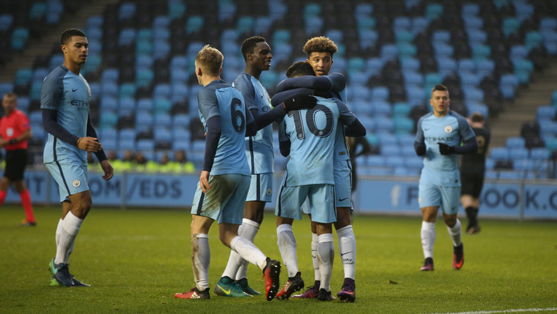 EQUALISER: Jadon Sancho and Paolo Fernandes celebrate after combining for City's second