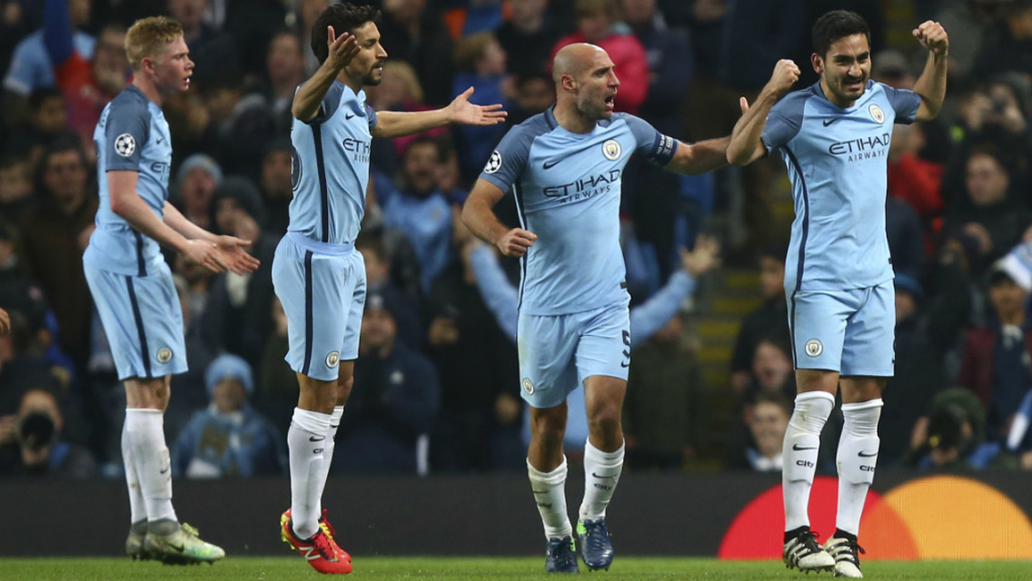 TOGETHER: Kevin De Bruyne, Jesus Navas and Pablo Zabaleta congratulate Ilkay Gundogan on his goal against Barcelona