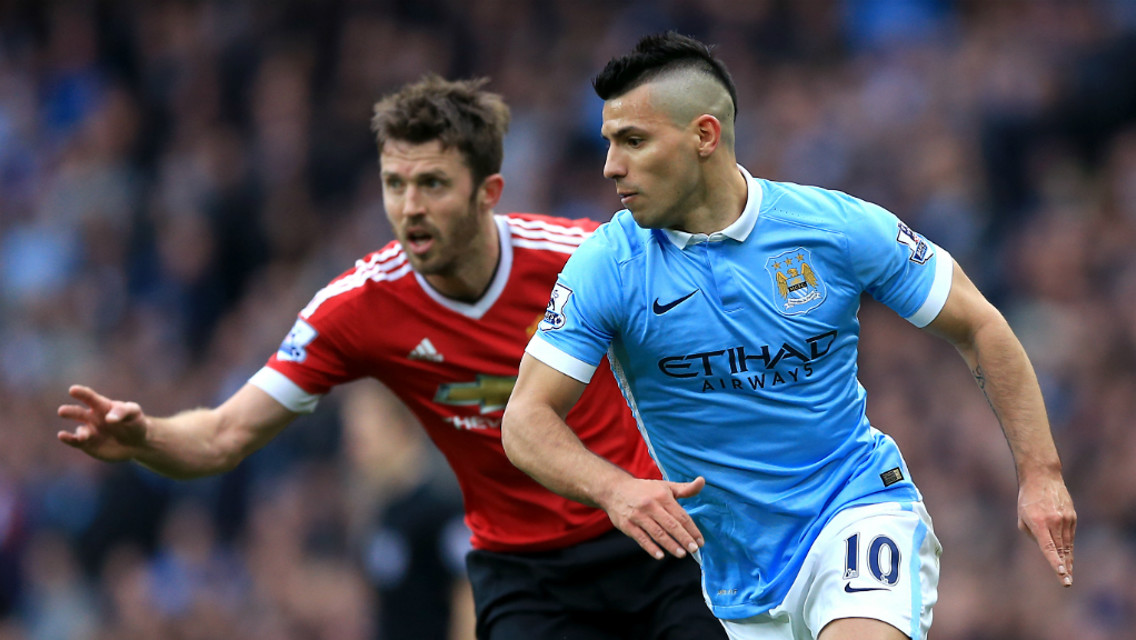 DERBY DUEL: Sergio Aguero and Michael Carrick go head-to-head