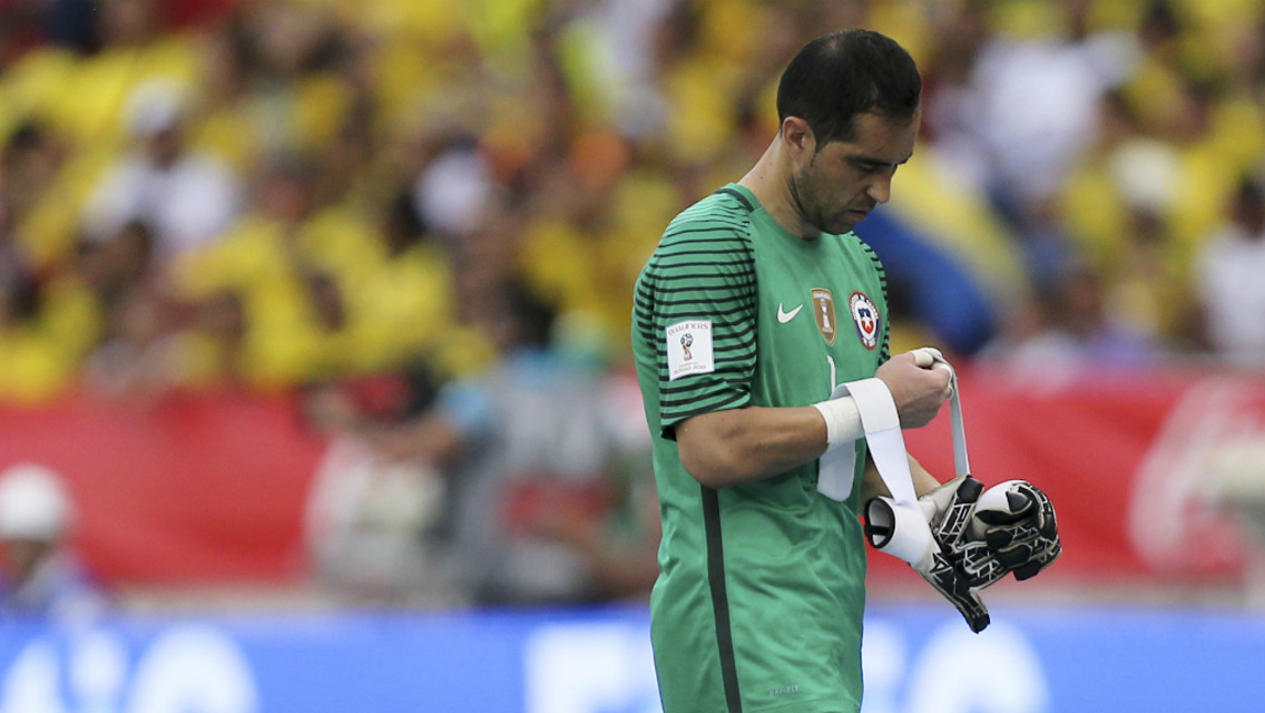 Claudio Bravo forced off during Chile clash