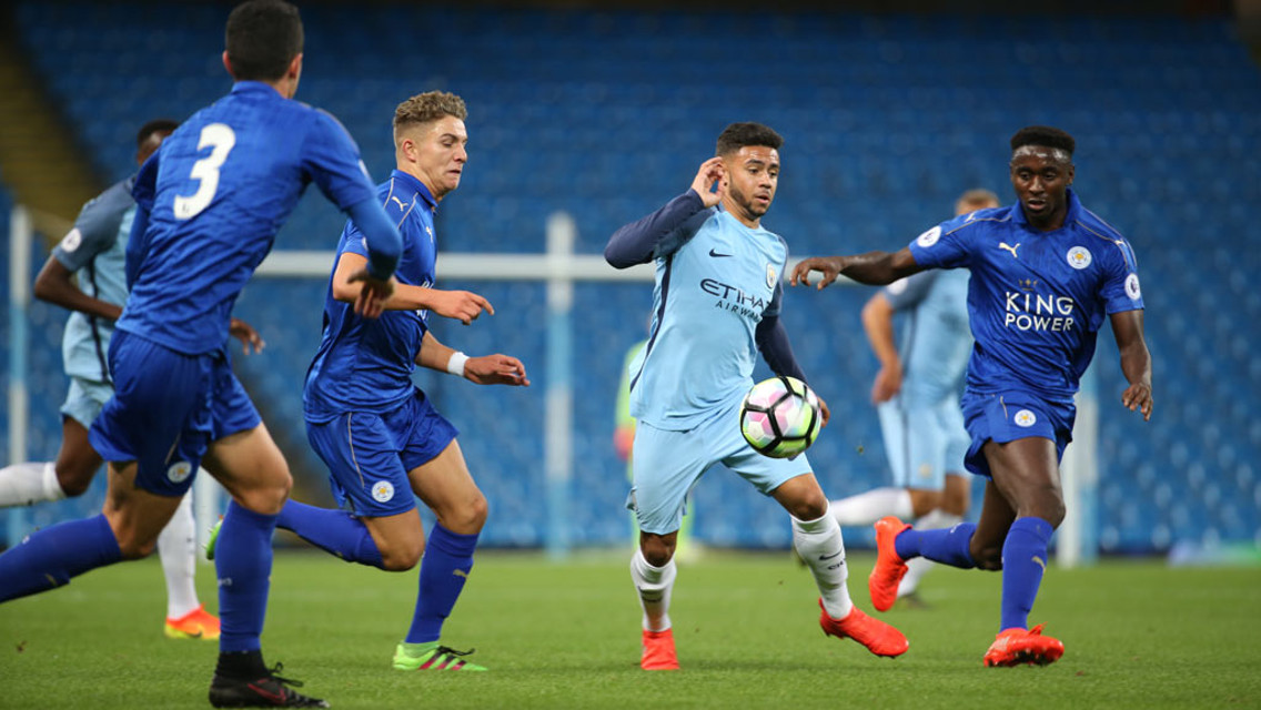 ALL AROUND ME: Fernandes is surrounded by Leicester shirts as he looks to get City back in the game