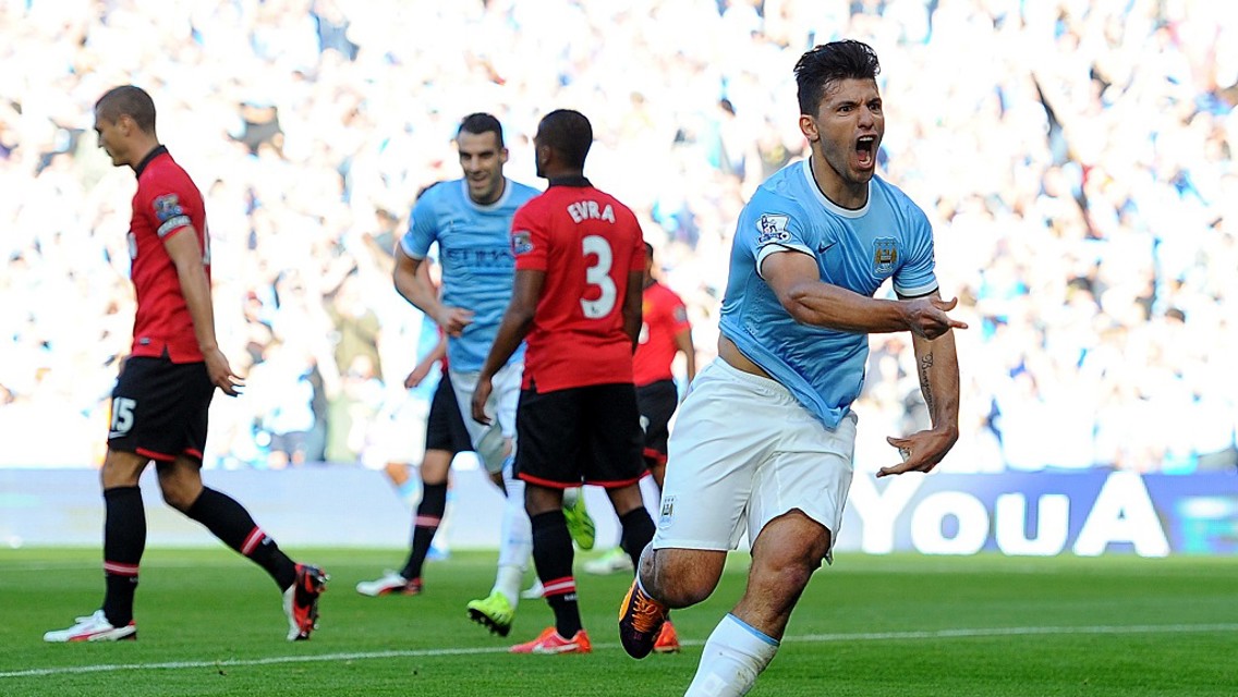 BACK OF THE NET: Sergio volleys City ahead in the 2013/14 Etihad derby