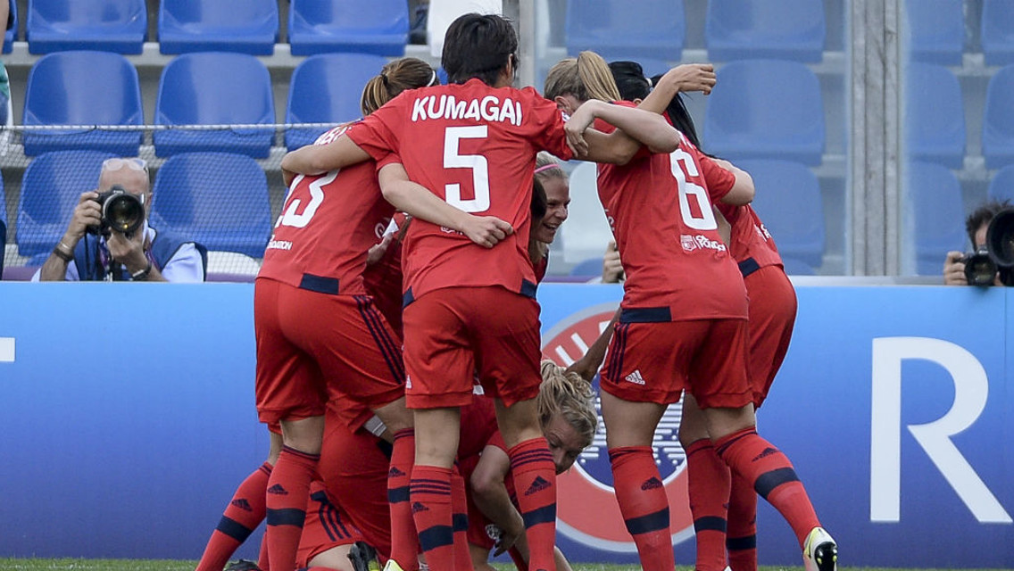 LYON: The French side celebrate during last season's Champions League final victory over Wolfsburg