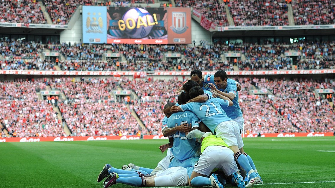 MOBBED: Yaya's historic winner versus Stoke