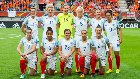 LIONESSES: England line up before their semi-final clash with the Netherlands.