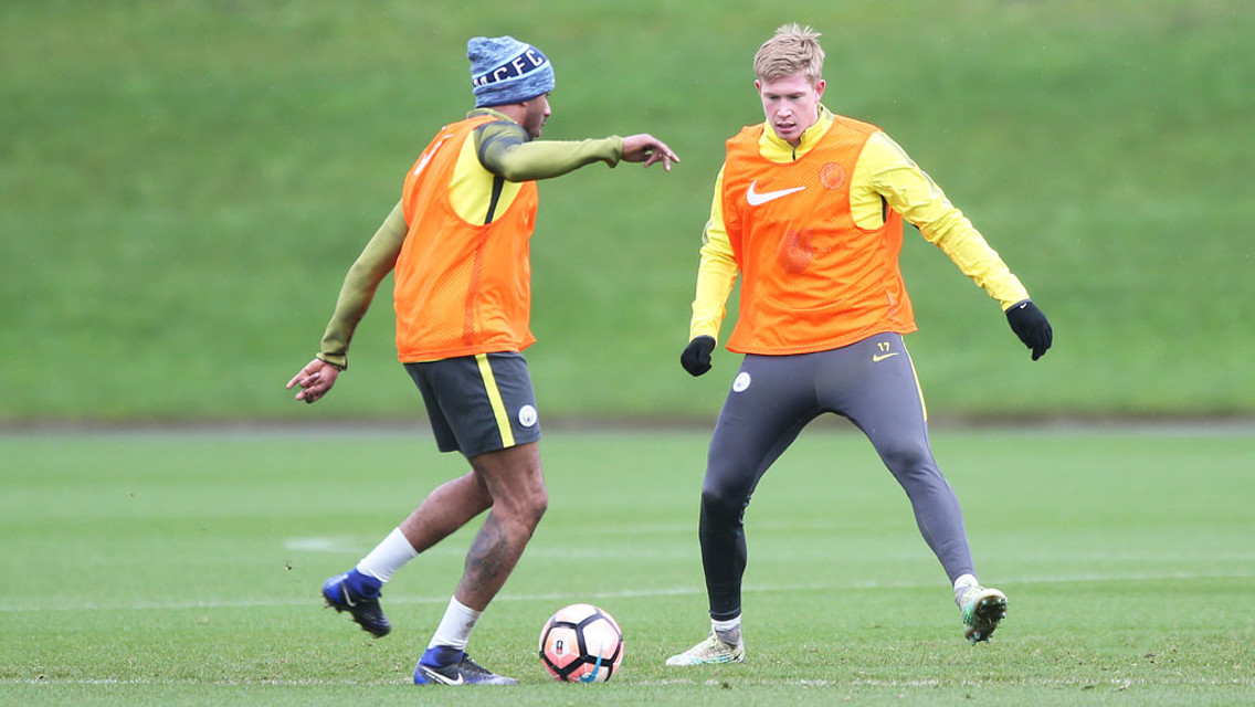BACK IN MANCHESTER: Delph and De Bruyne back in action as the Manchester rain swoops down.