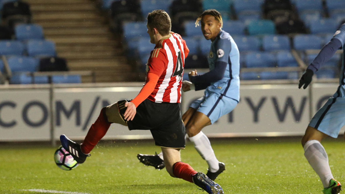 STRAIGHT IN: Demeaco Duhaney fires Manchester City into the lead against Sunderland
