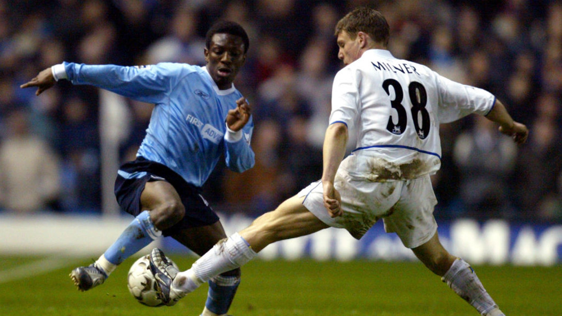 TWO CITY NAMES: Shaun Wright-Phillips and James Milner on opposite sides during a match between City and Leeds