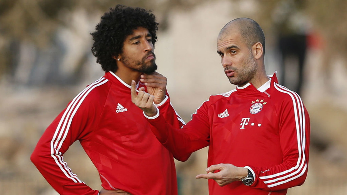 WORKING TOGETHER: Dante and Pep Guardiola spent two years alongside each other at Bayern Munich