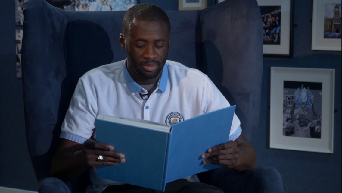 BUZZIN: Yaya Toure takes a lesson in Mancunian 