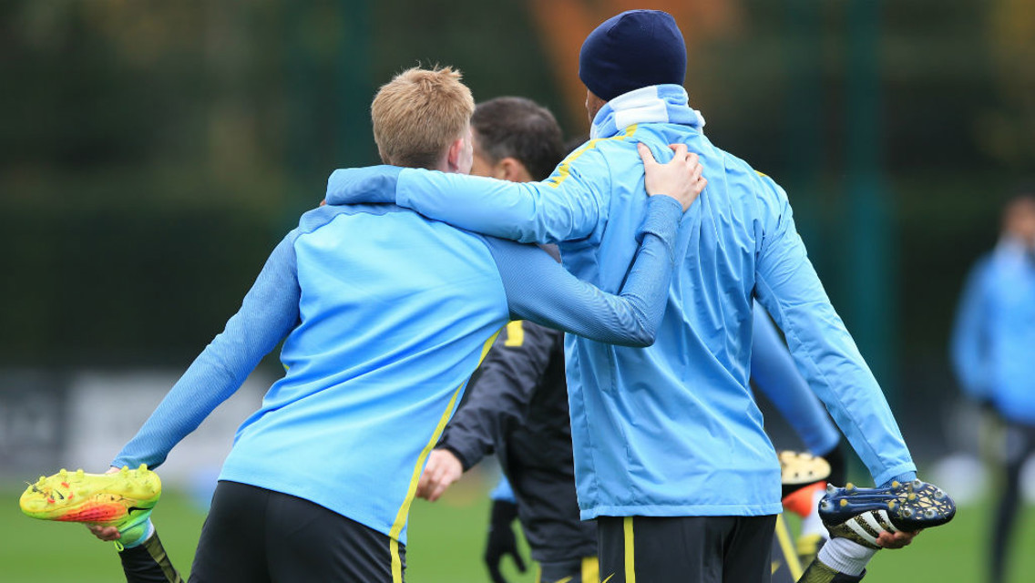 BELGIAN BUDDIES: Vincent Kompany and Kevin De Bruyne embrace during training