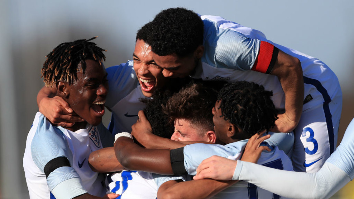 ENGLAND: Isaac Buckley-Ricketts joins in the celebrations with his England teammates